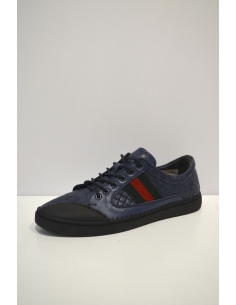 Sneaker en cuir à rayures...